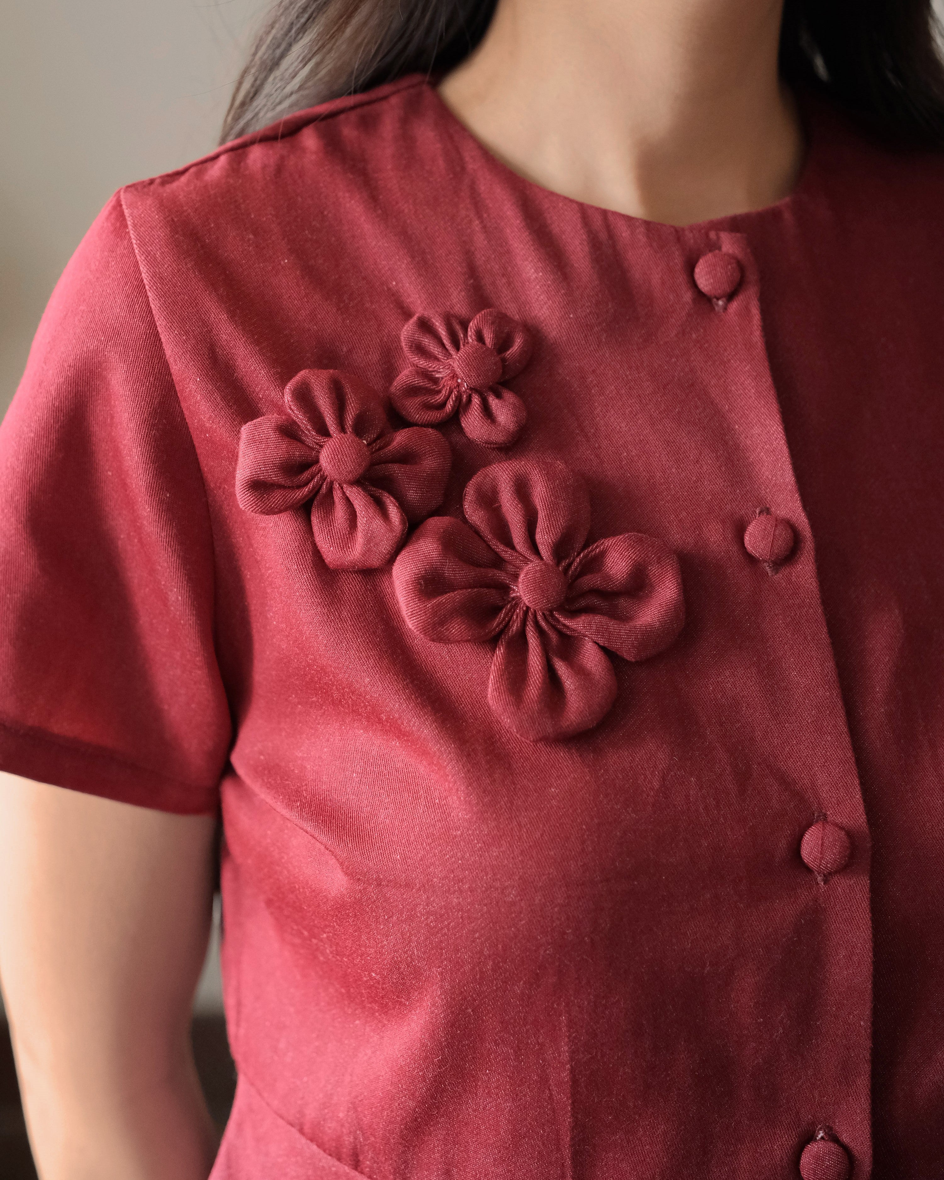 Lady Faith Peplum Top in Maroon