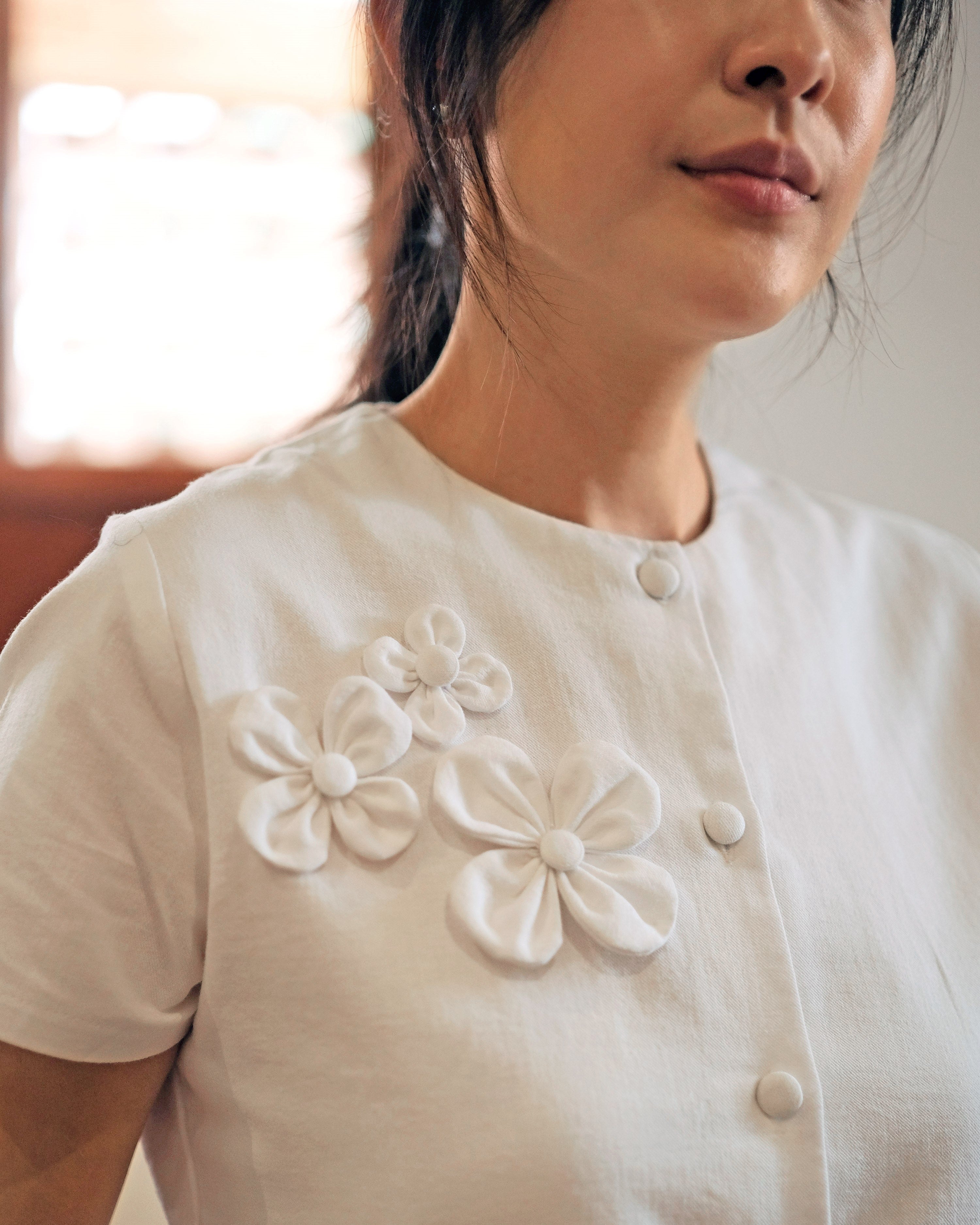Lady Faith Peplum Top in White