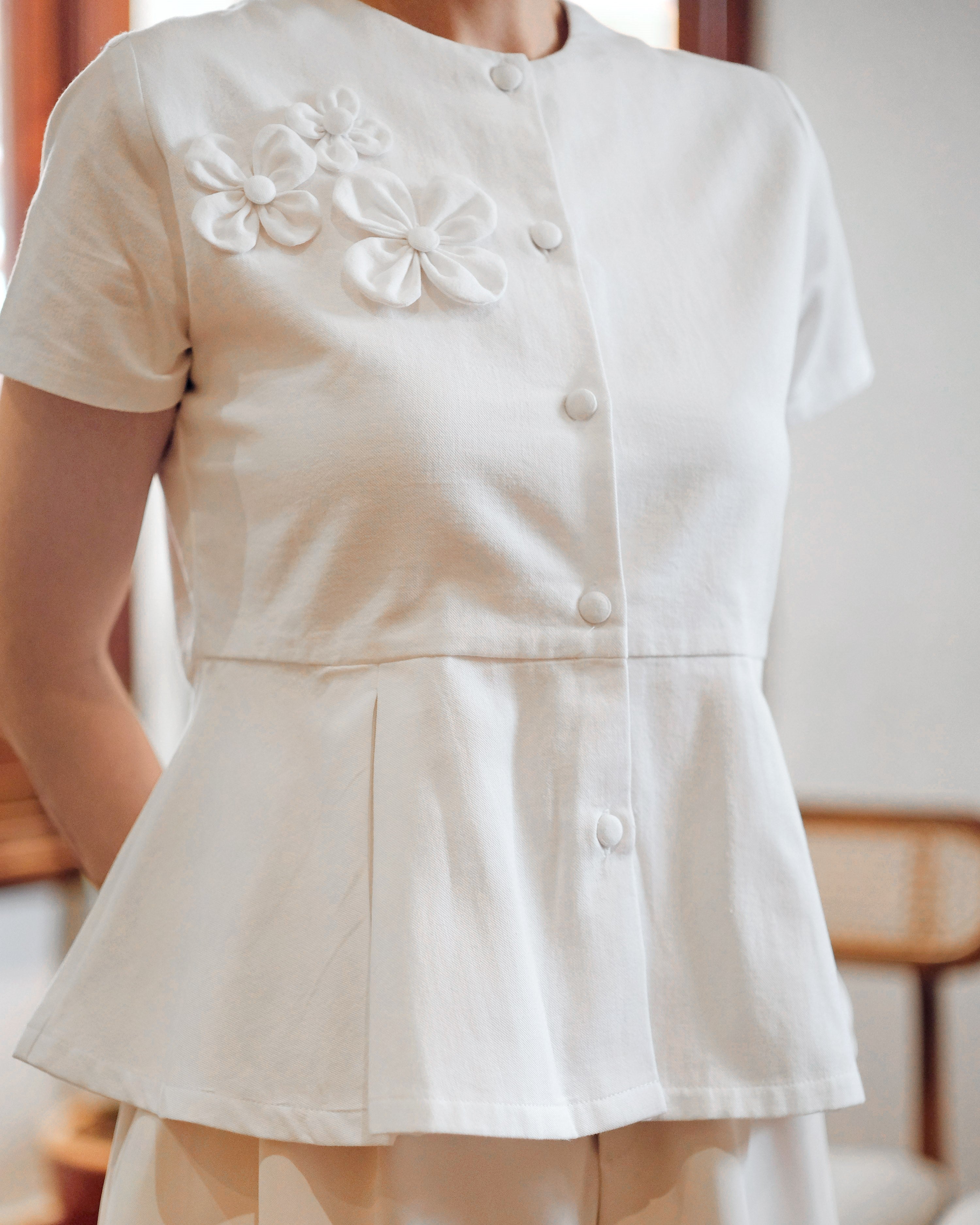 Lady Faith Peplum Top in White