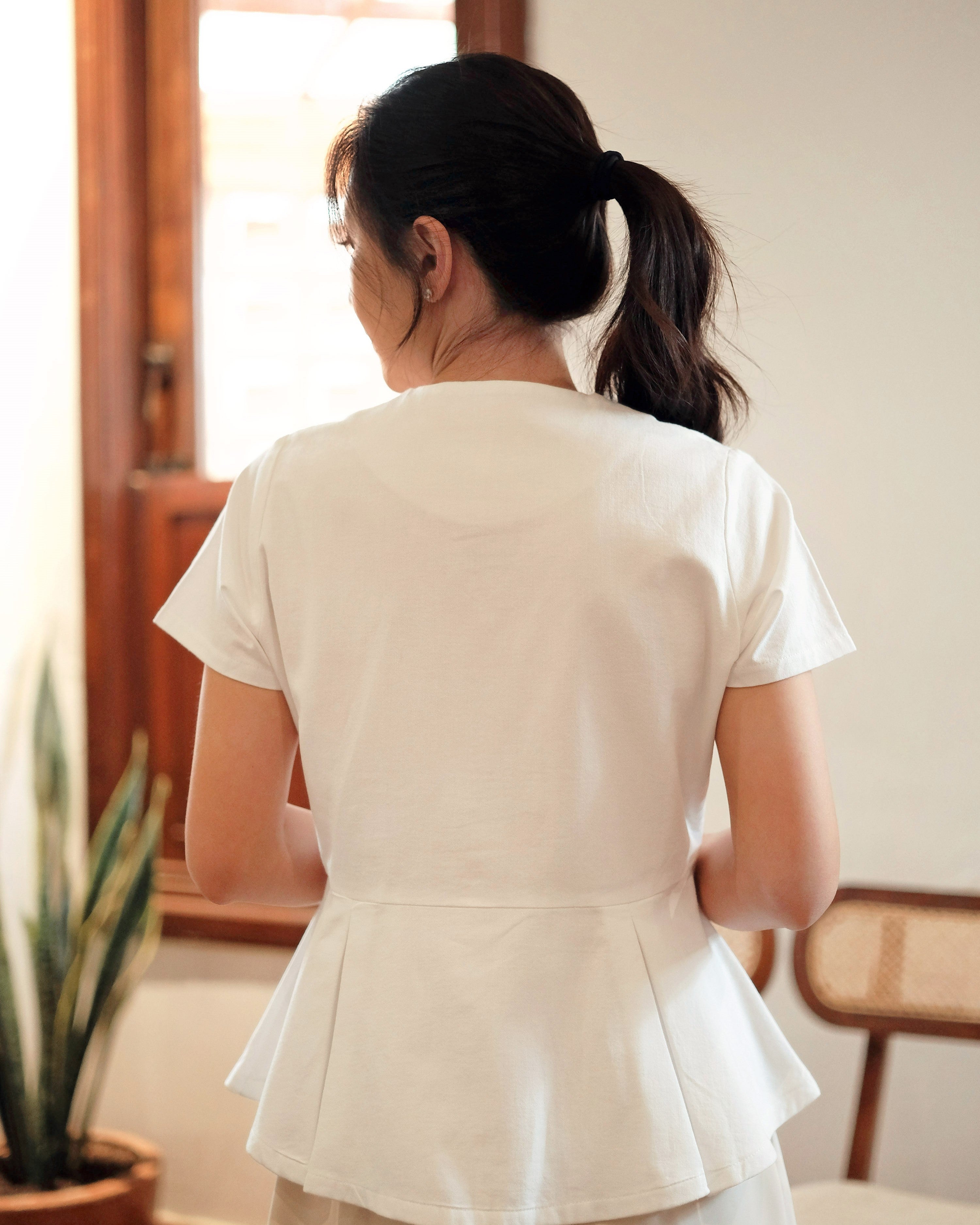 Lady Faith Peplum Top in White