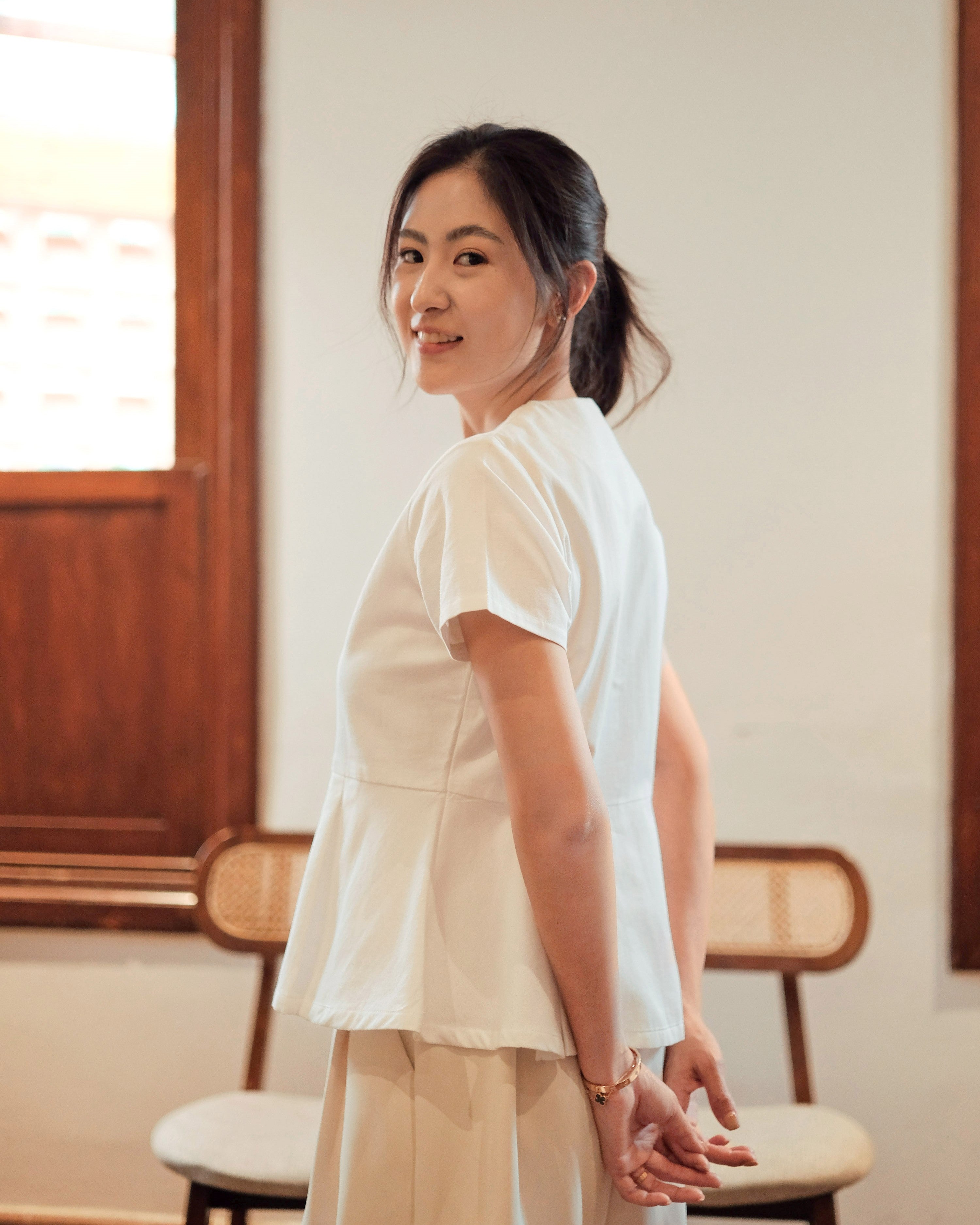 Lady Faith Peplum Top in White