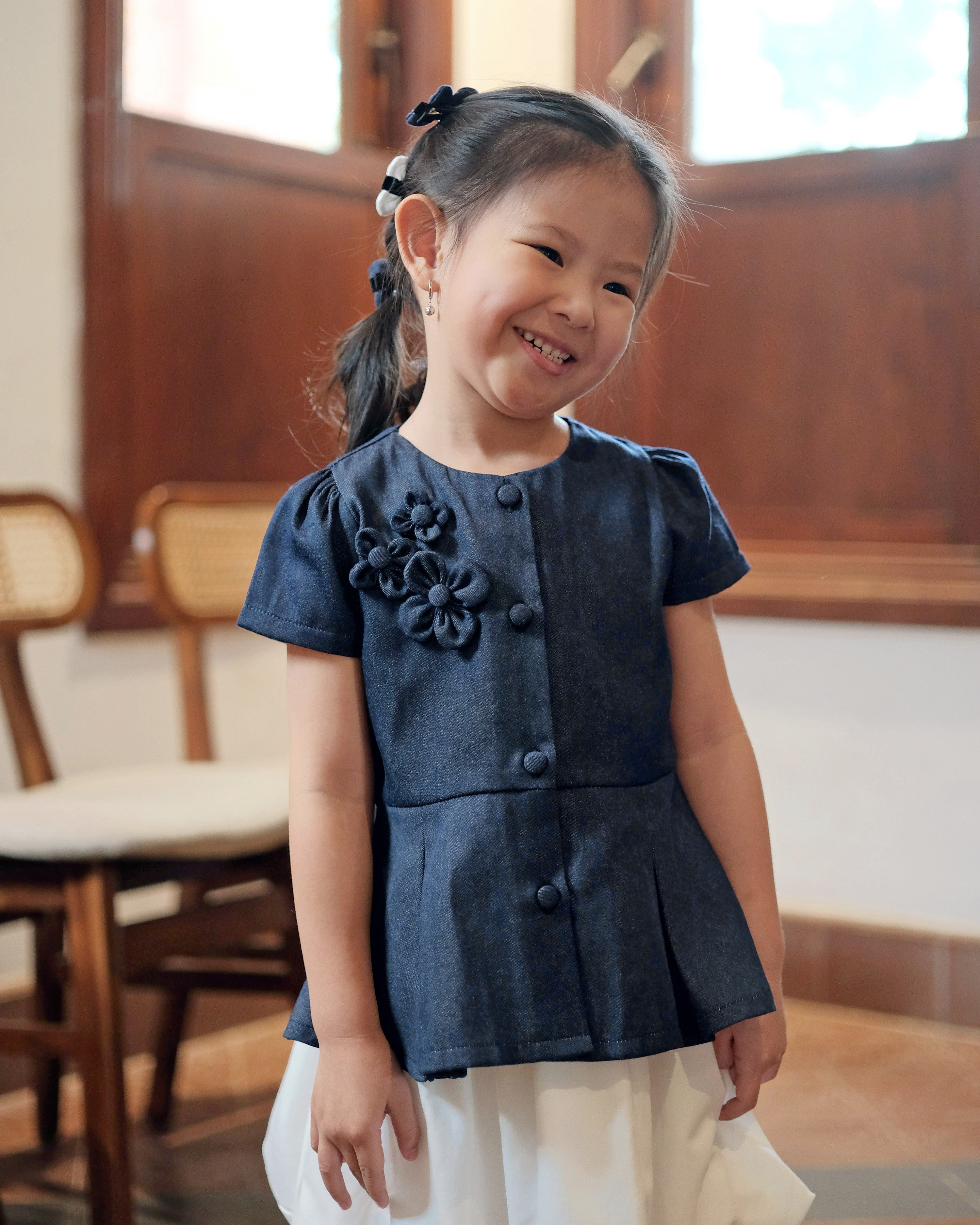 Faith Peplum Top in Denim