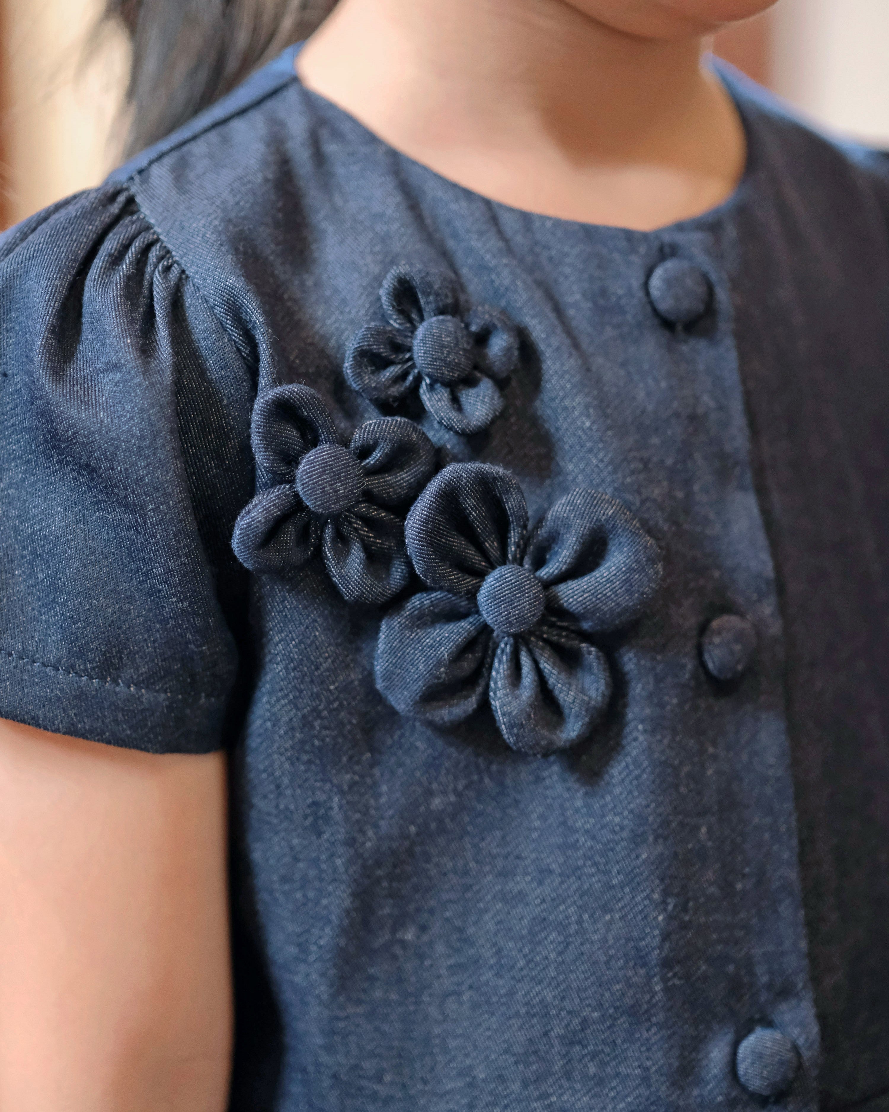 Faith Peplum Top in Denim