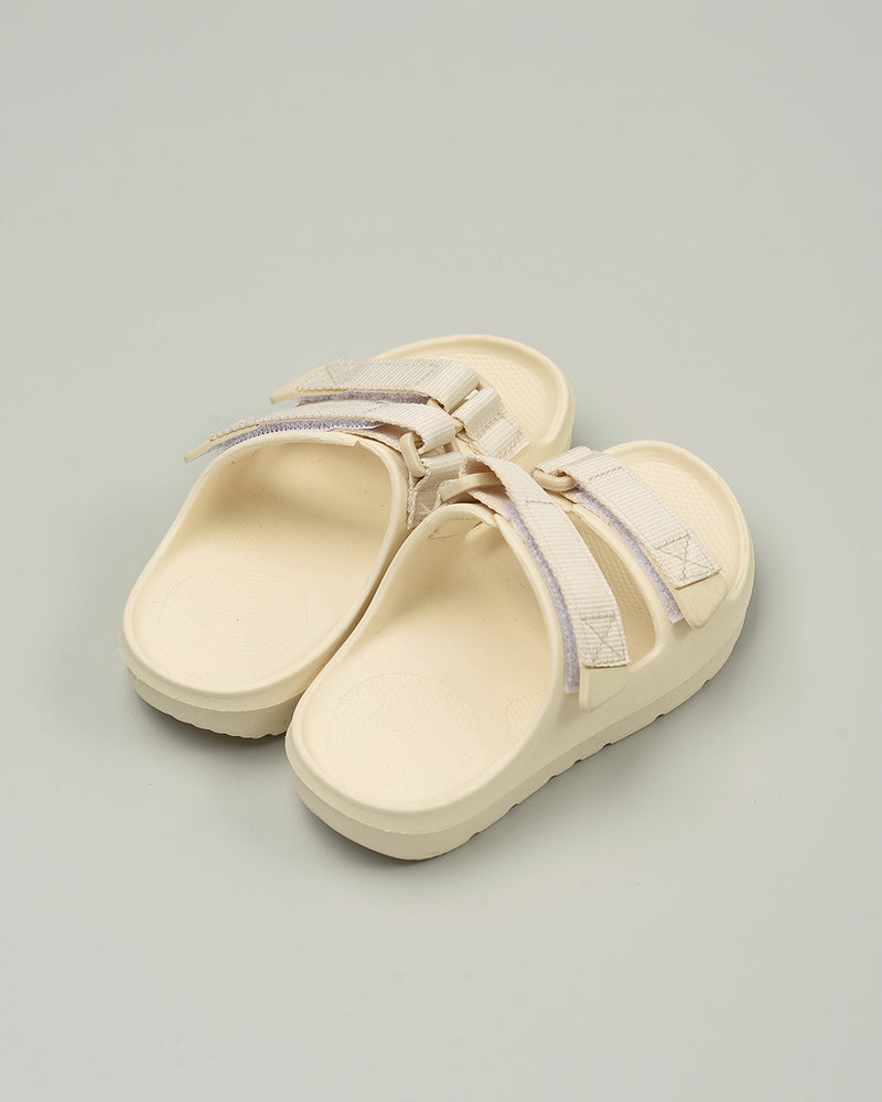 Carter Slip On Sandals in Beige