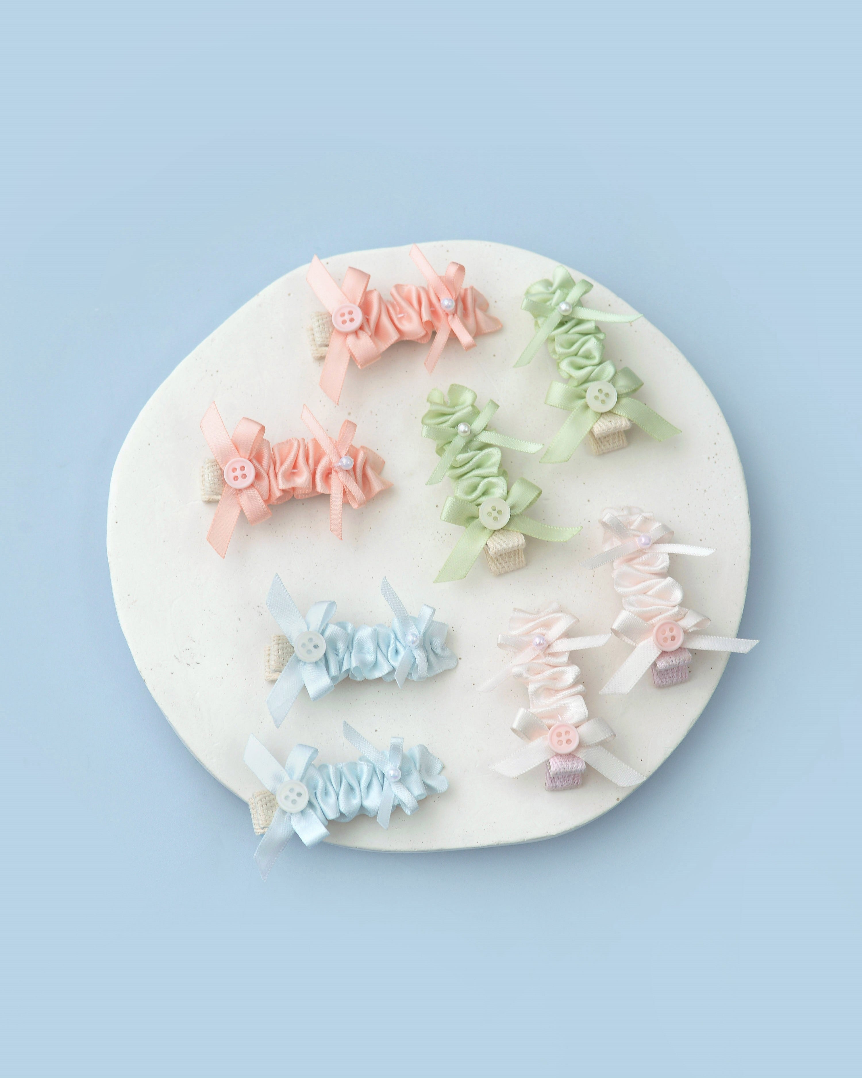 Frosty Swirl Ruffle Hairpin in Light Blue
