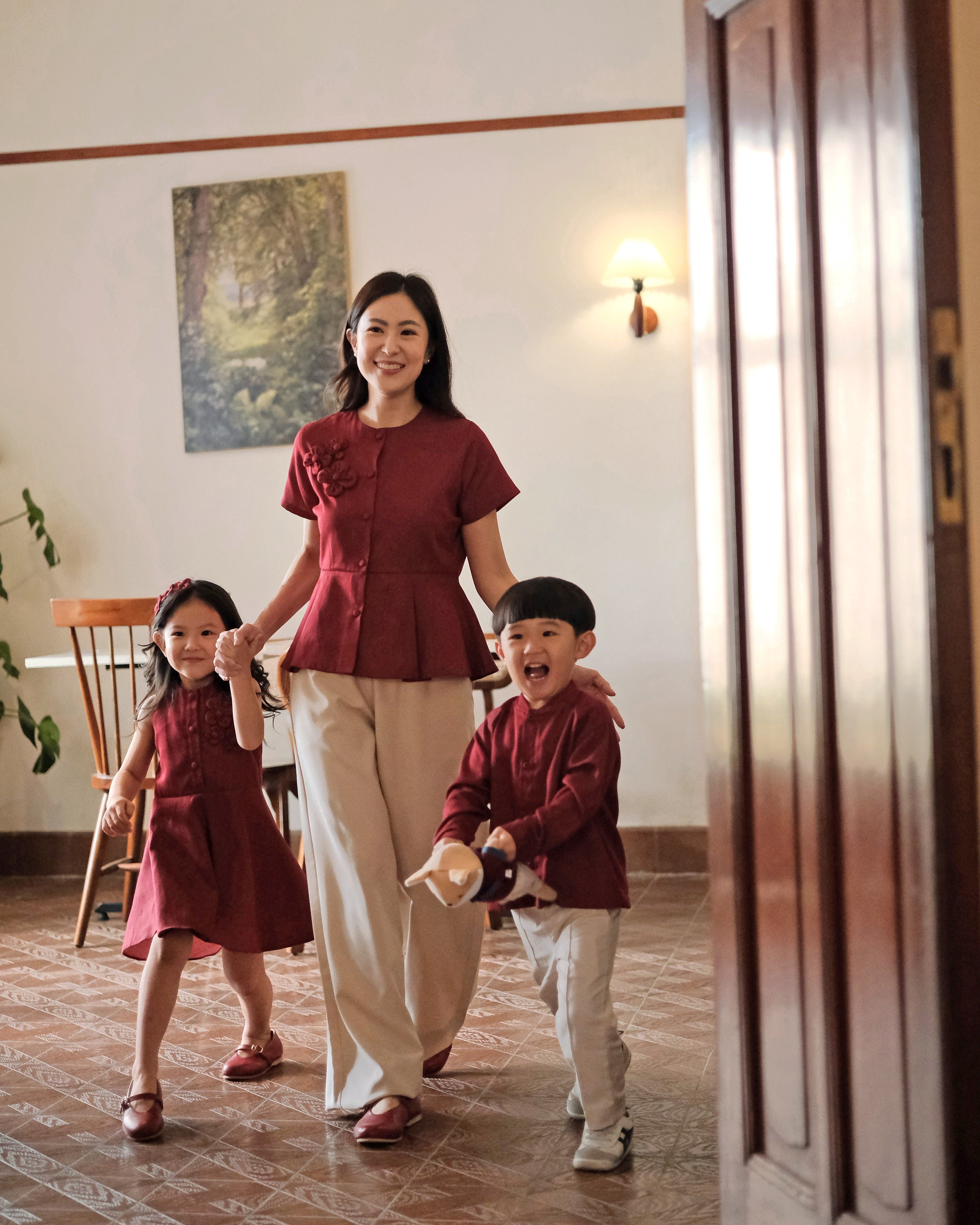 Lady Faith Peplum Top in Maroon