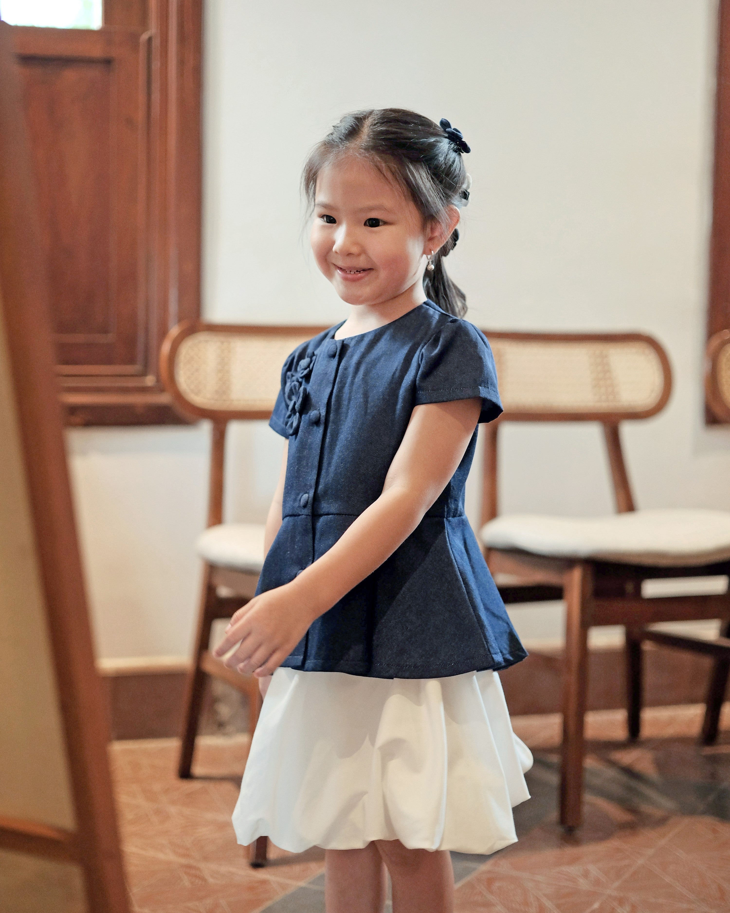 Faith Peplum Top in Denim