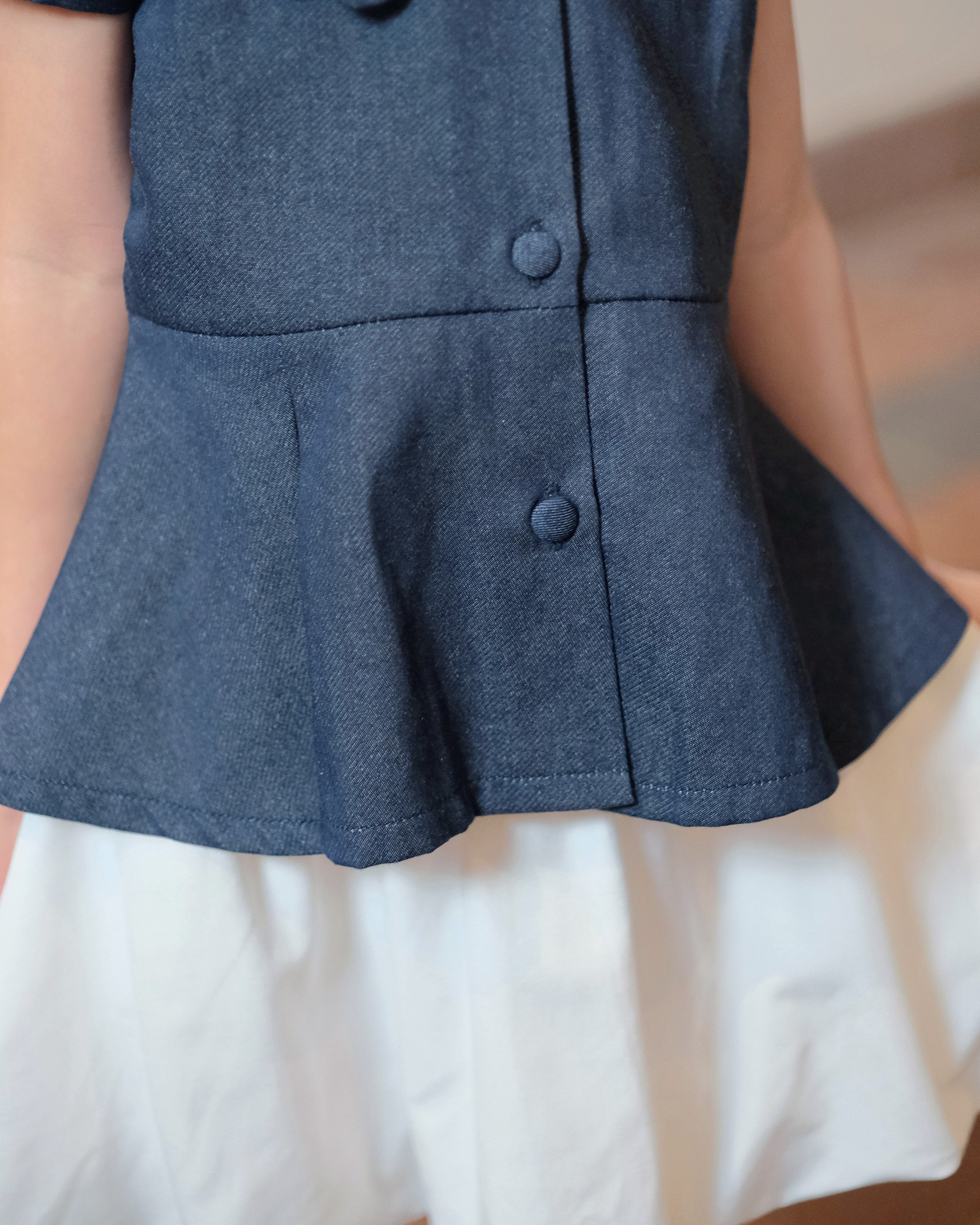 Faith Peplum Top in Denim